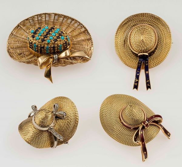 Four gold brooches