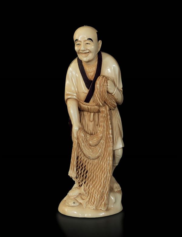 A carved ivory figure, Japan, early 20th century
