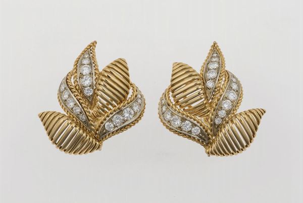 Pair of gold and diamond earrings