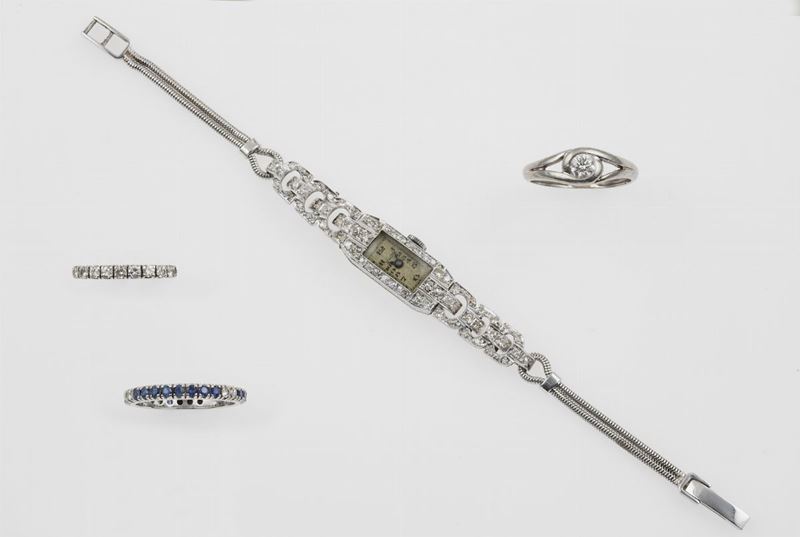 Lotto composto da un orologio per signora e tre anelli con diamanti e zaffiri  - Auction Jewels - Timed Auction - Cambi Casa d'Aste