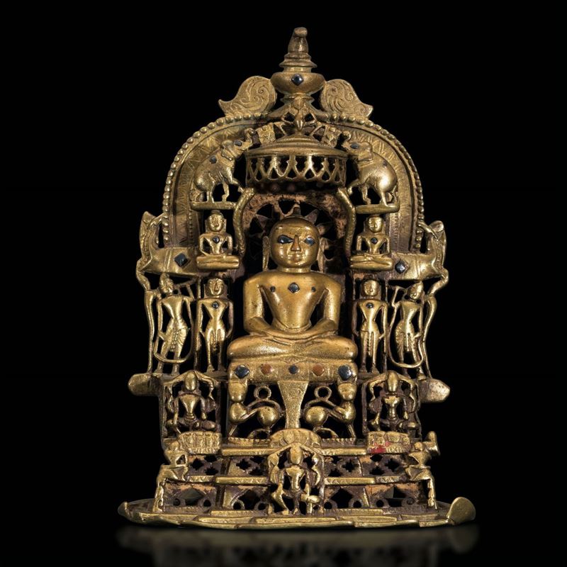 Figura di Parshvanatha shrine entro aura in bronzo con innesti in pietre dure, India, probabilmente XIII secolo  - Asta Fine Chinese Works of Art - Cambi Casa d'Aste
