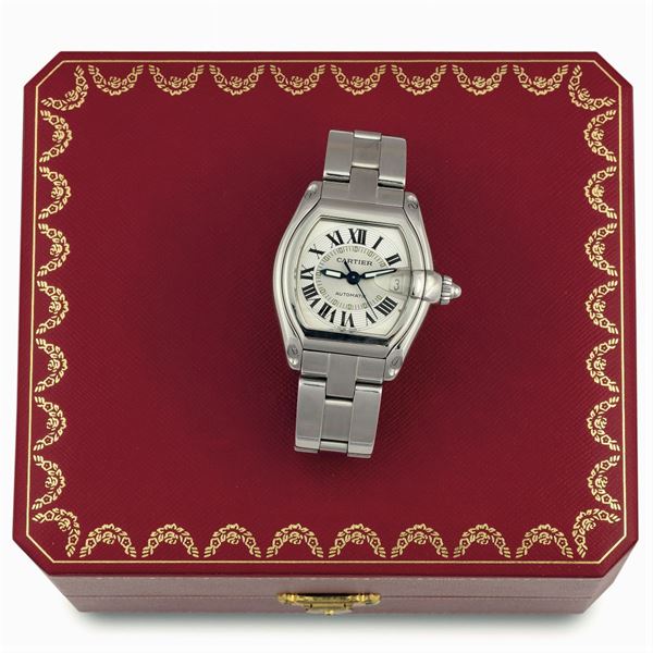 Cartier, Roadster Automatic, Ref. 2510. Fine, tonneau-shaped, curved, center seconds, self-winding, water-resistant, stainless steel wristwatch with date and quick change stainless steel Cartier bracelet with double deployant clasp. Accompanied by the original fitted box, Guarantee and instruction booklet. Made circa 2000's