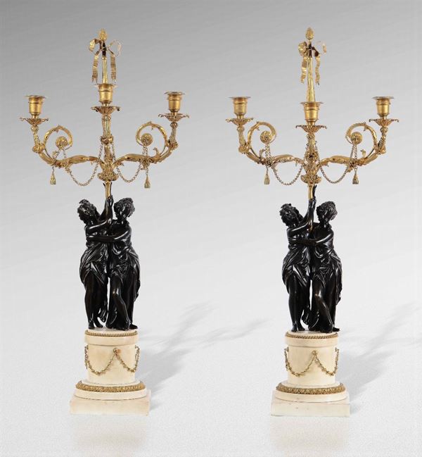 Coppia di candelabri in bronzo patinato e dorato, Francia, inizio XIX secolo
