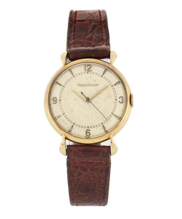 JAEGER LECOULTRE - Yellow gold wrist watch.