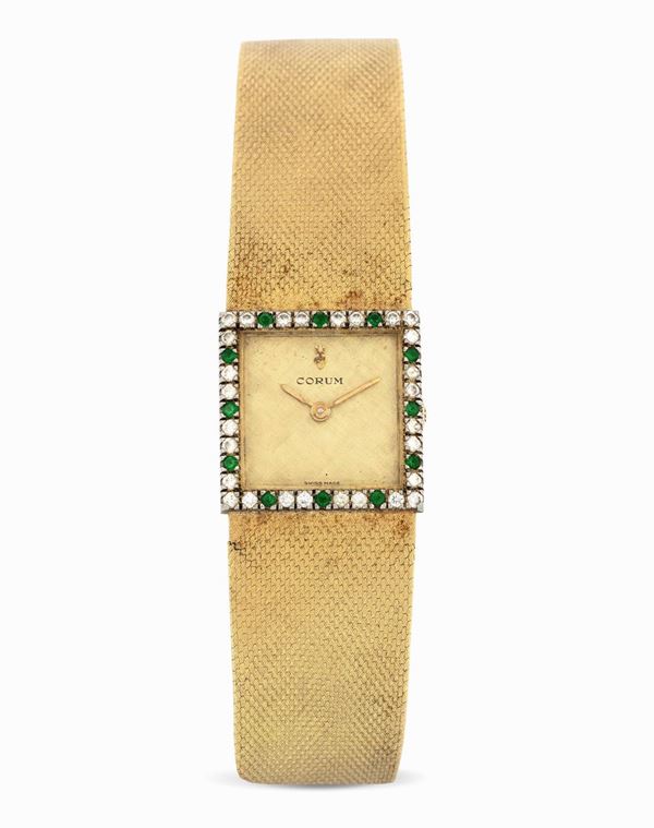 CORUM - Yellow gold, white gold and jewels ladies wristwatch with a yellow gold tissue strap.