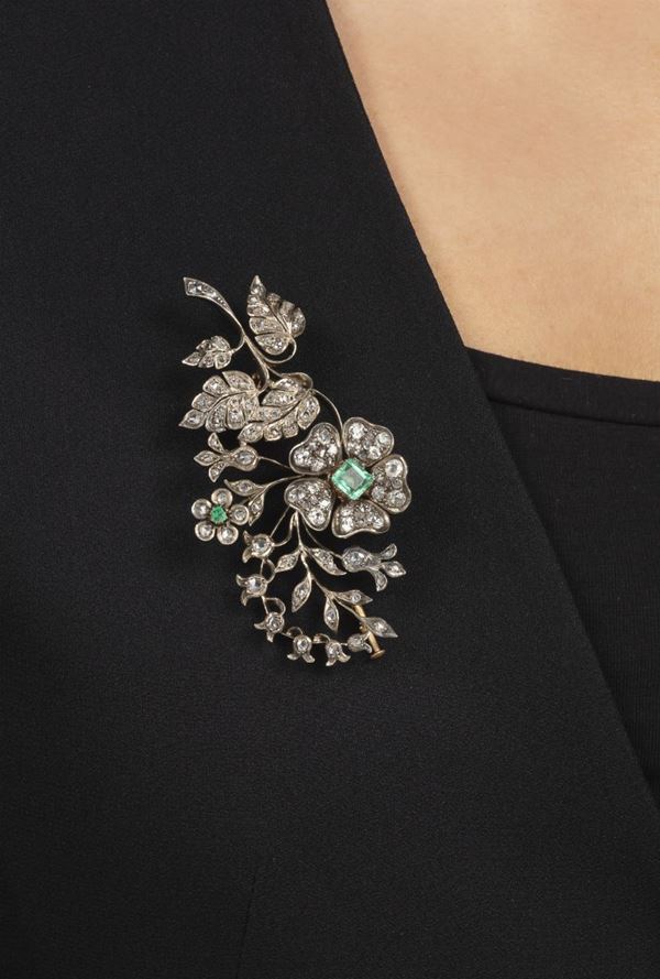 Emerald, diamond, gold and silver brooch