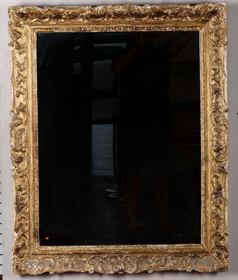 Specchiera in legno intagliato e dorato  - Asta Arredi, Dipinti e Oggetti d'Arte - Cambi Casa d'Aste