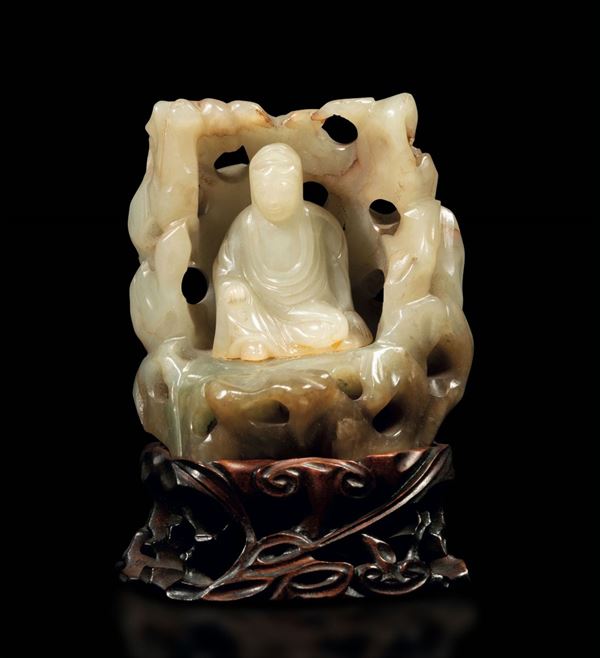 A white jade and russet group, China, Qing Dynasty