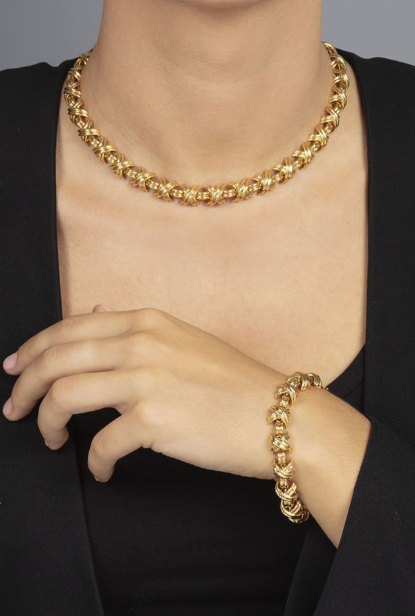 Gold “X” demi-parure. Signed Tiffany & Co.