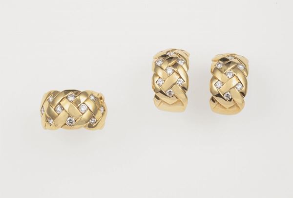 Demi-parure composta da anello ed orecchini con diamanti