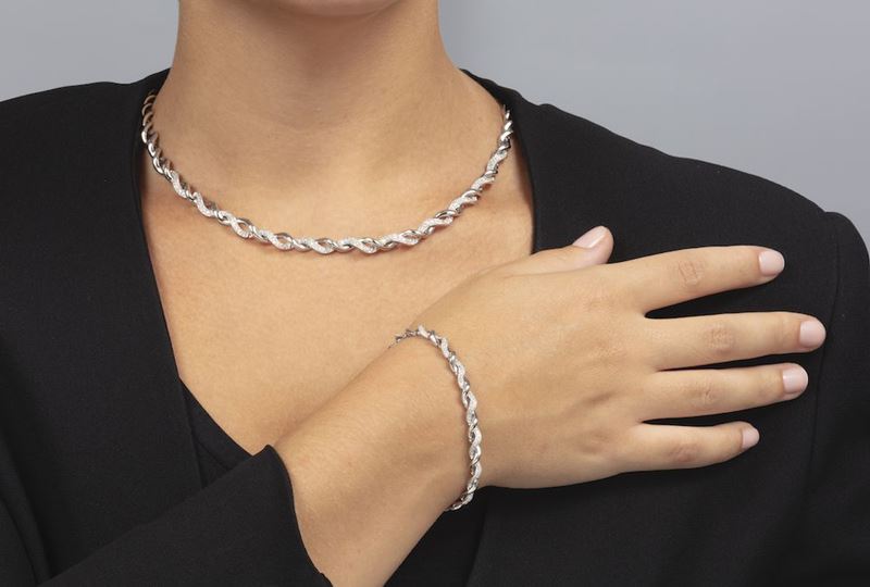 Demi-parure composta da collana e bracciale con diamanti  - Auction Jewels - Time Auction - Cambi Casa d'Aste