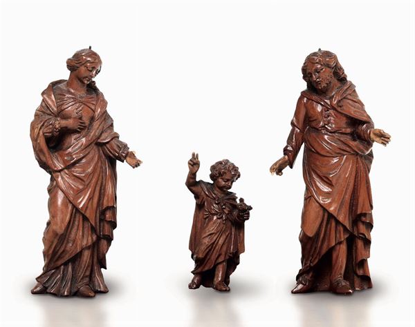 Sacra Famiglia. Gruppo in legno scolpito. Fiandre XVII secolo