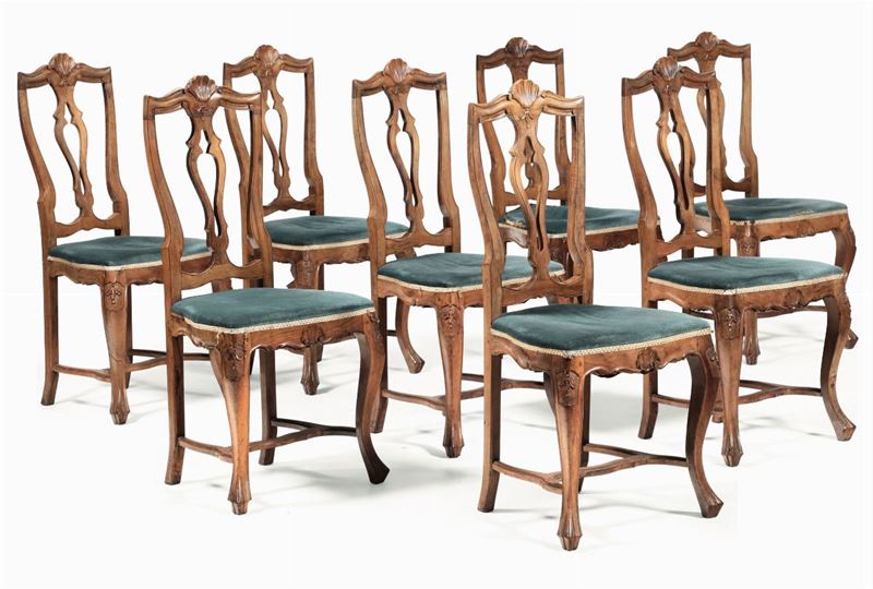 Otto sedie in noce intagliato, XIX-XX secolo  - Asta Antiquariato - Cambi Casa d'Aste