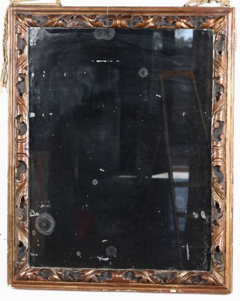 Specchiera in legno intagliato, XIX secolo  - Asta Arredi, Dipinti e Oggetti d'Arte - Cambi Casa d'Aste