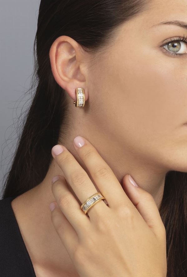 Demi-parure composta da anello ed orecchini con diamanti taglio baguette e rotondo