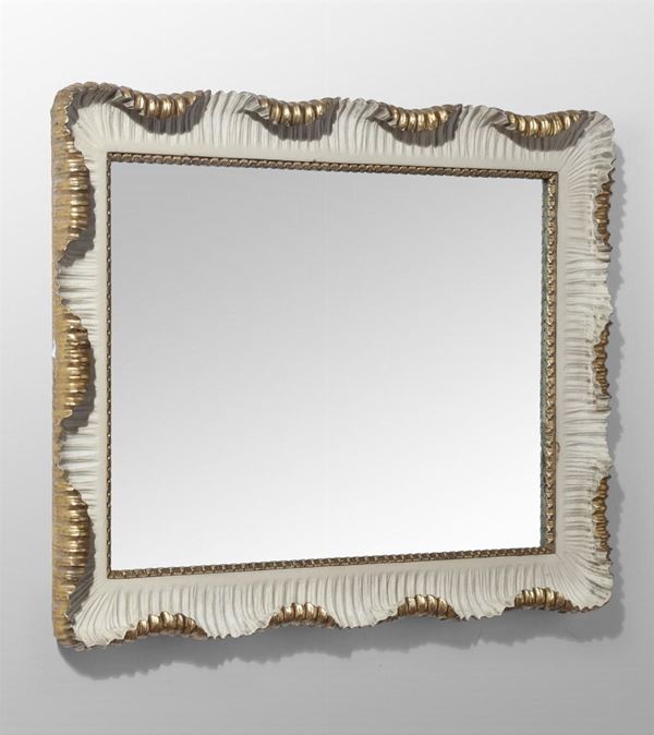 A mirror with wooden frame, Italy, 1940 ca.