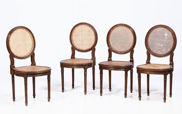 Quattro sedie in legno patinato e paglia di Vienna in stile Luigi XVI, XIX secolo