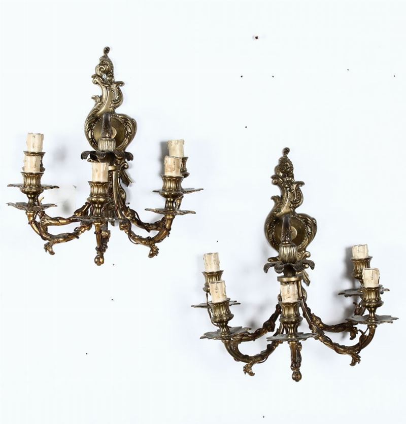Coppia di appliques in bronzo dorato a cinque luci. Francia, fine XIX secolo  - Auction Furnitures, Paintings and Works of Art - Cambi Casa d'Aste