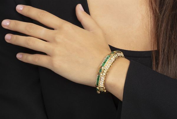 Emerald, diamond and gold bangle