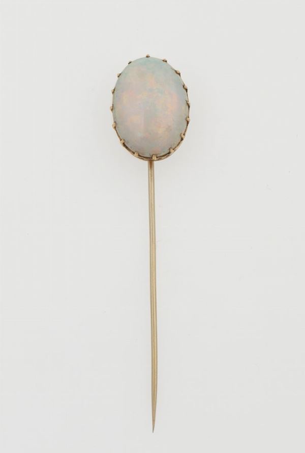 Opal and gold tie pin