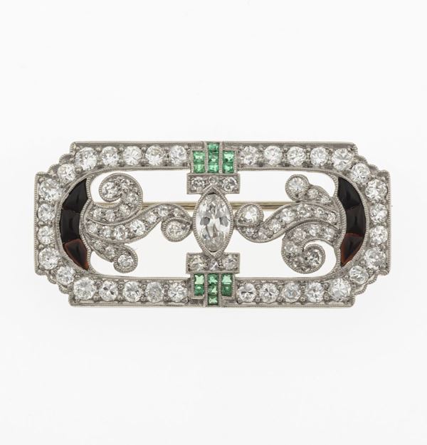 Diamond, emerald, onyx and platinum brooch