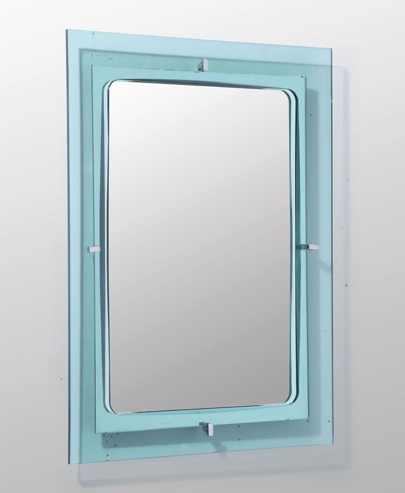 Specchio da parete con profilo in vetro colorato, molato e vetro specchiato particolari in ottone nichelato.  - Auction Design - Cambi Casa d'Aste