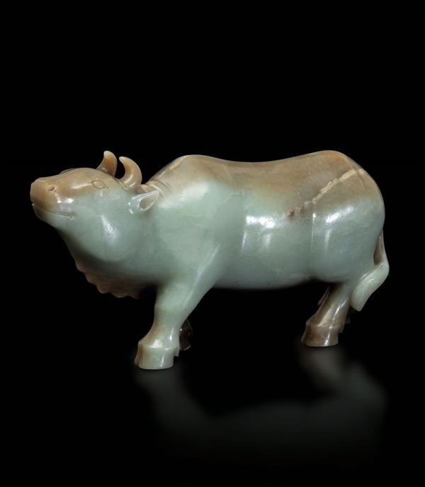 A Celadon jade and russet ox, China, Qing Dynasty
