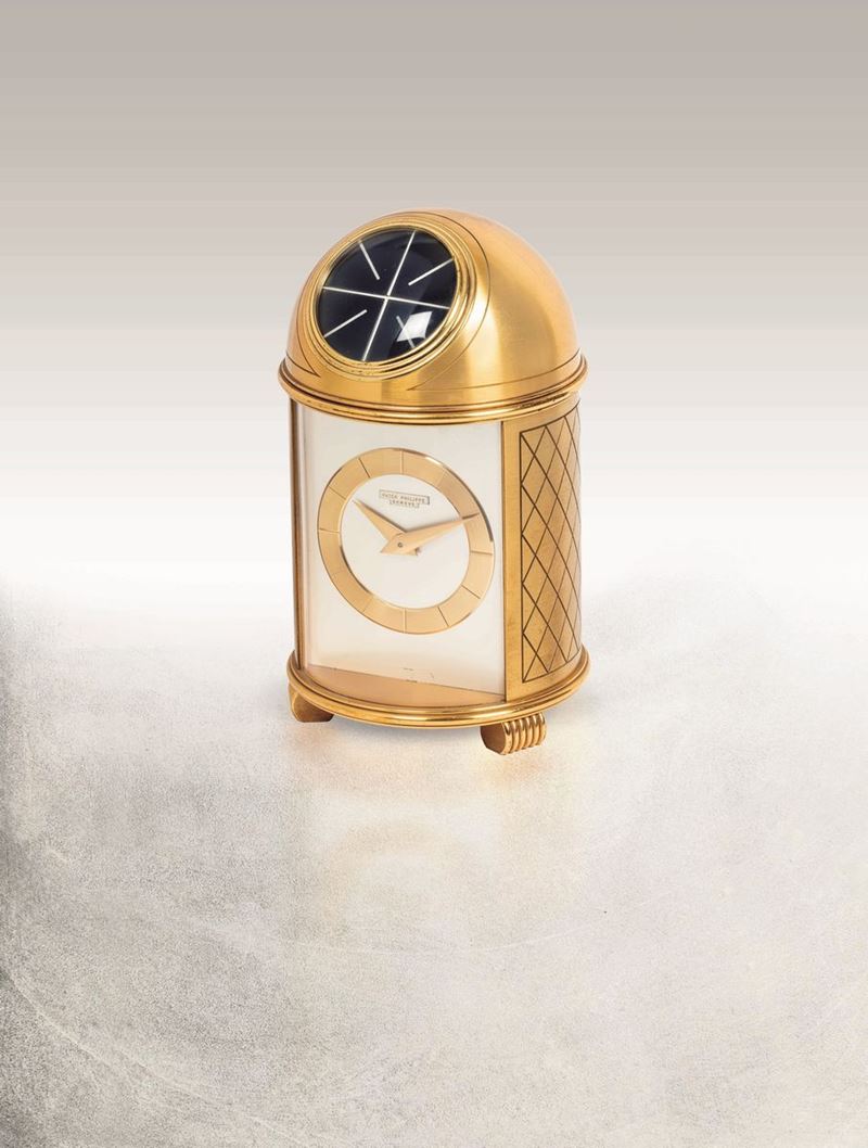 PATEK PHILIPPE - Brass table clock. 220x125 mm.  - Auction Important Wristwatches and Pocket Watches - Cambi Casa d'Aste