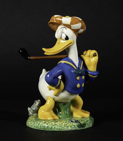 Zaccagnini, Ceramiche Zaccagnini S.A., Figura di Paperino golfista in ceramica a colaggio policro...