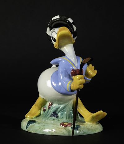 Ugo Zaccagnini, Figura di Paperino golfista in ceramica a colaggio policroma