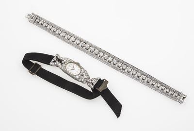 Lotto Composto da un Bracciale con Diamanti ed un Orologio per Signora