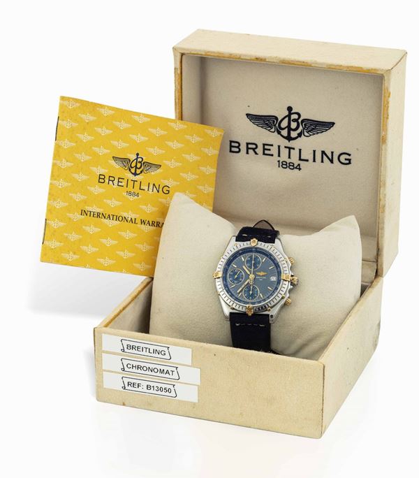 BREITLING - Stainless steel and yellow gold chronograph, date at 3 o'clock. Fitted with original box, warranty and replacement leather strap.