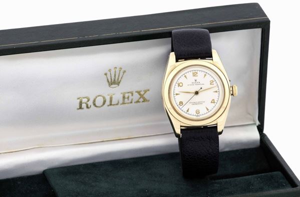ROLEX - Yellow gold and white dial Oyster Perpetual.
