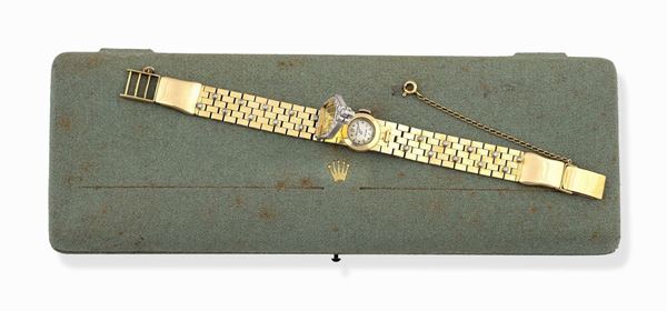 ROLEX - Elegantissimo orologio da donna in oro giallo, oro bianco e brillanti, dotato di scatola Rolex originale.