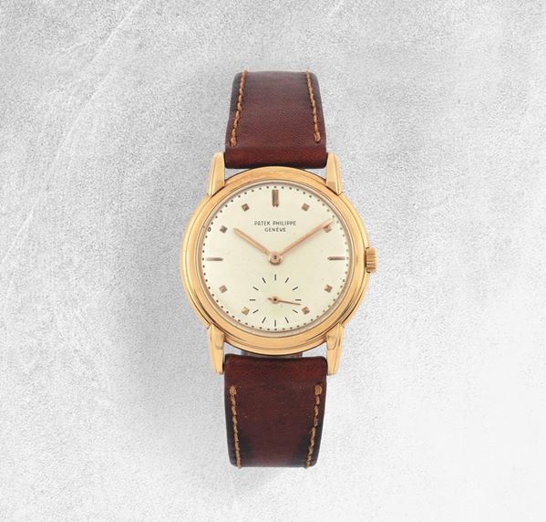PATEK PHILIPPE - Elegant rose gold wristwatch with leather strap.