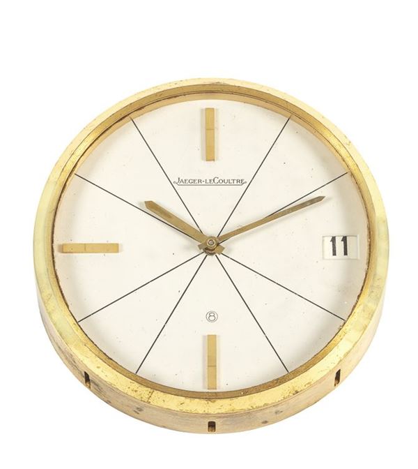JAEGER LECOULTRE - Brass table clock with indices and date at 3 o'clock.