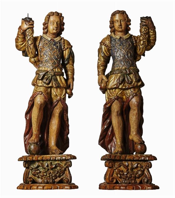 Coppia di angeli reggicero. Legno policromo e dorato. Scultore rinascimentale lombardo XVI secolo