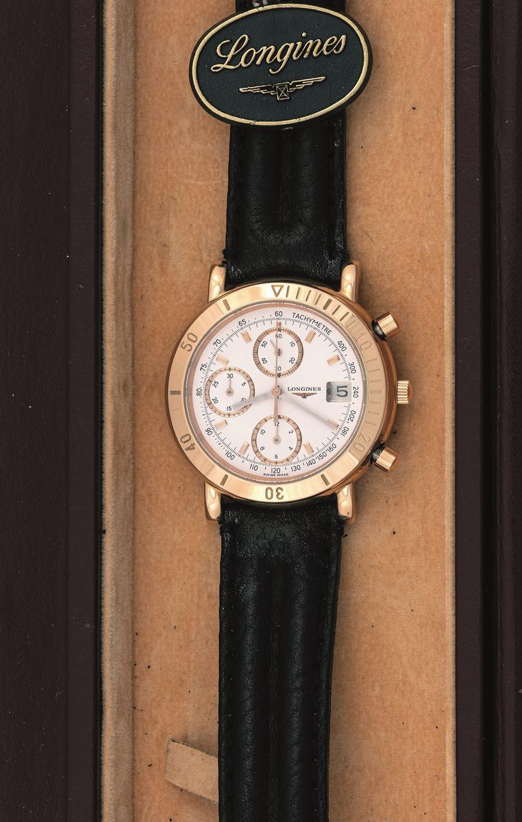 LONGINES - Elegante orologio da polso in oro rosa con data ad ore 3, indici e scala tachimetrica. Conservato nella scatola originale.  - Asta Orologi da Polso e da Tasca - Cambi Casa d'Aste