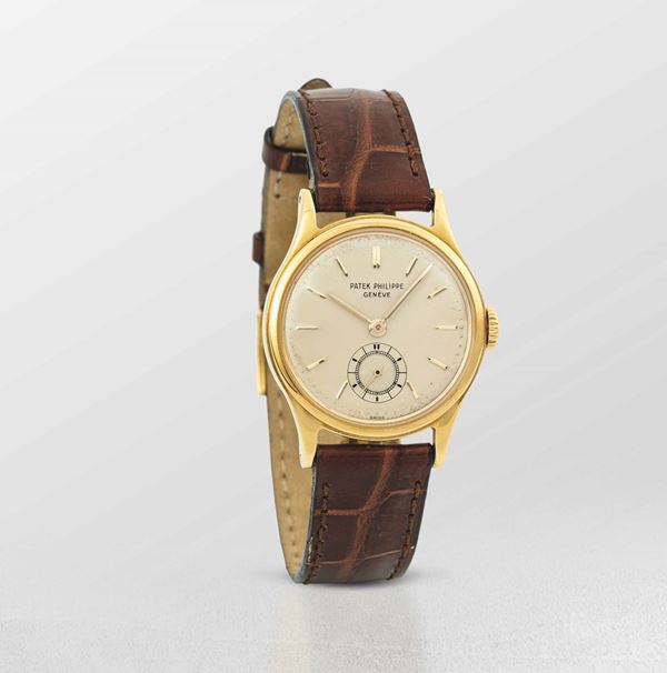 PATEK PHILIPPE - 2451 Calatrava. Very fine and rare yellow gold vintage wristwatch with second hand at 6 o'clock.