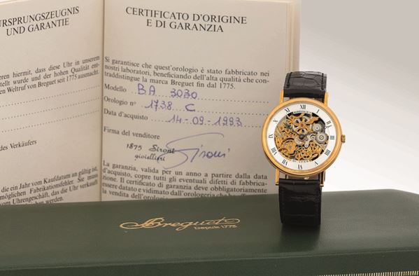 BREGUET - Affascinante orologio da polso scheletrato in oro giallo che mostra un bellissimo movimento in oro giallo. Completo di scatola originale e garanzia.