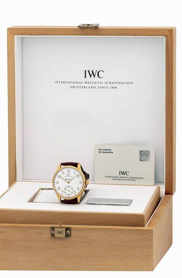 IWC - Very fine rose gold Portugieser F.A. Jones wristwatch, limited edition n° 988/1000, with second hand at 6 o'clock. Equipped with original box, guarantee and instruction manual.