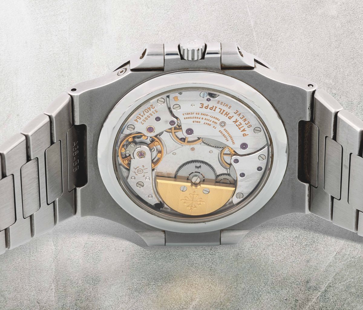 Patek Philippe - Raro ed Elegante Nautilus in Acciaio con Data e Fasi Lunari. Completo di Corredo...
