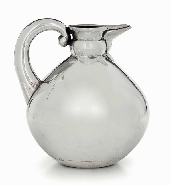 A silver pitcher with spout, Milan, 1900s