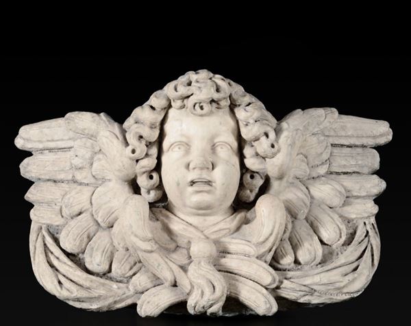 Monumentale testa di cherubino. Marmo bianco. Arte barocca genovese del XVII secolo