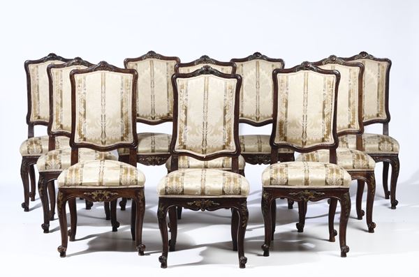 Dieci sedie in legno intagliato e parzialmente dorato. Roma, XVIII secolo