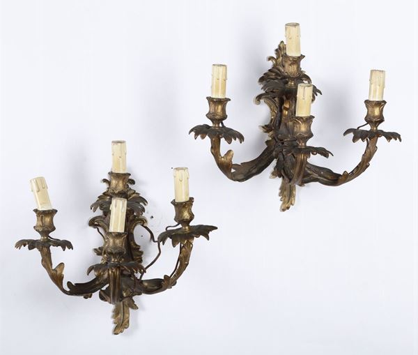 Coppia di applique bronzo a quattro luci e coppia di appliques a due luci, XIX secolo