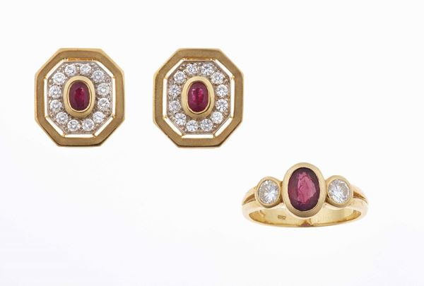 Lotto composto da anello ed orecchini con rubini e diamanti