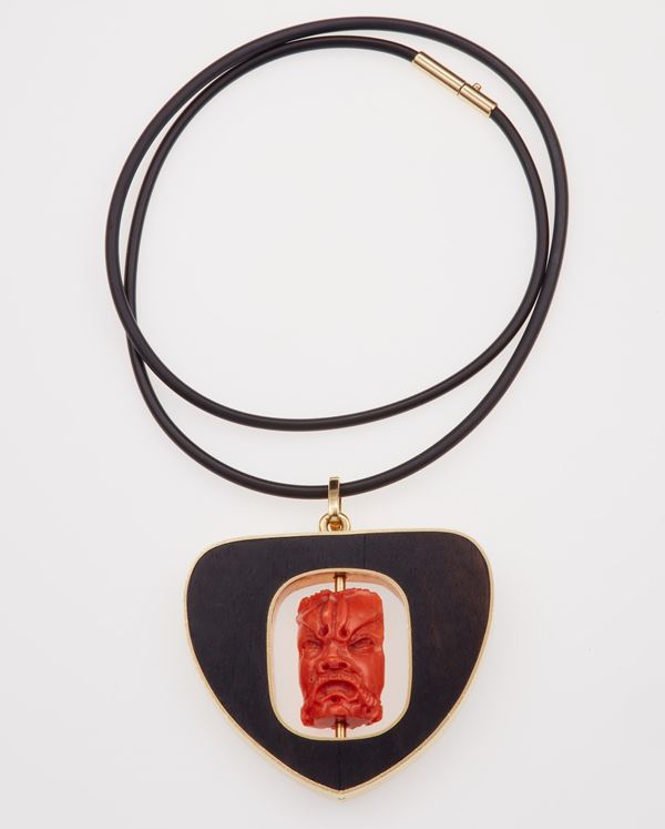 Wood, coral and gold pendant