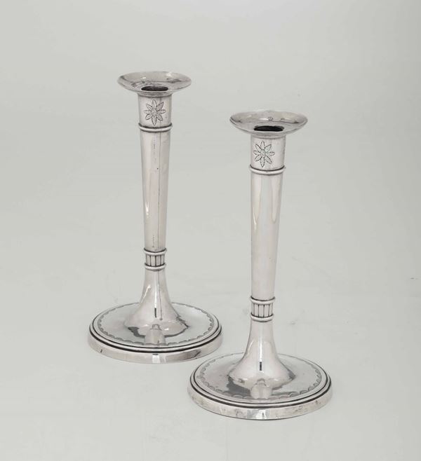 Coppia di candelieri in argento. 1809/1810. Eseguiti da Vincenzo Torre attivo dal 1800 al 1821