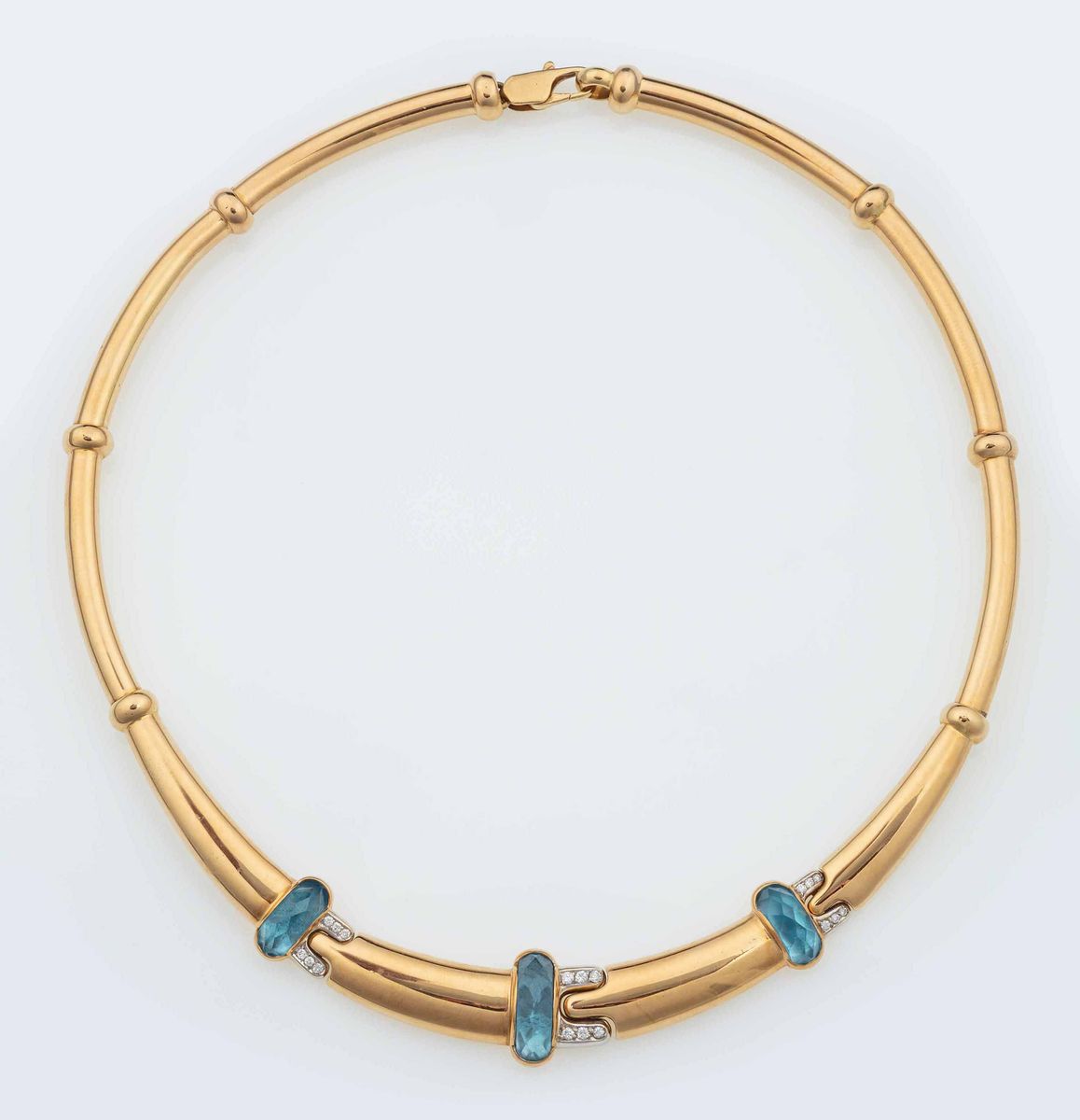 Giò Caroli. Demi-parure Composta da Girocollo e Bracciale Rigido con Topazi Azzurri e Diamanti